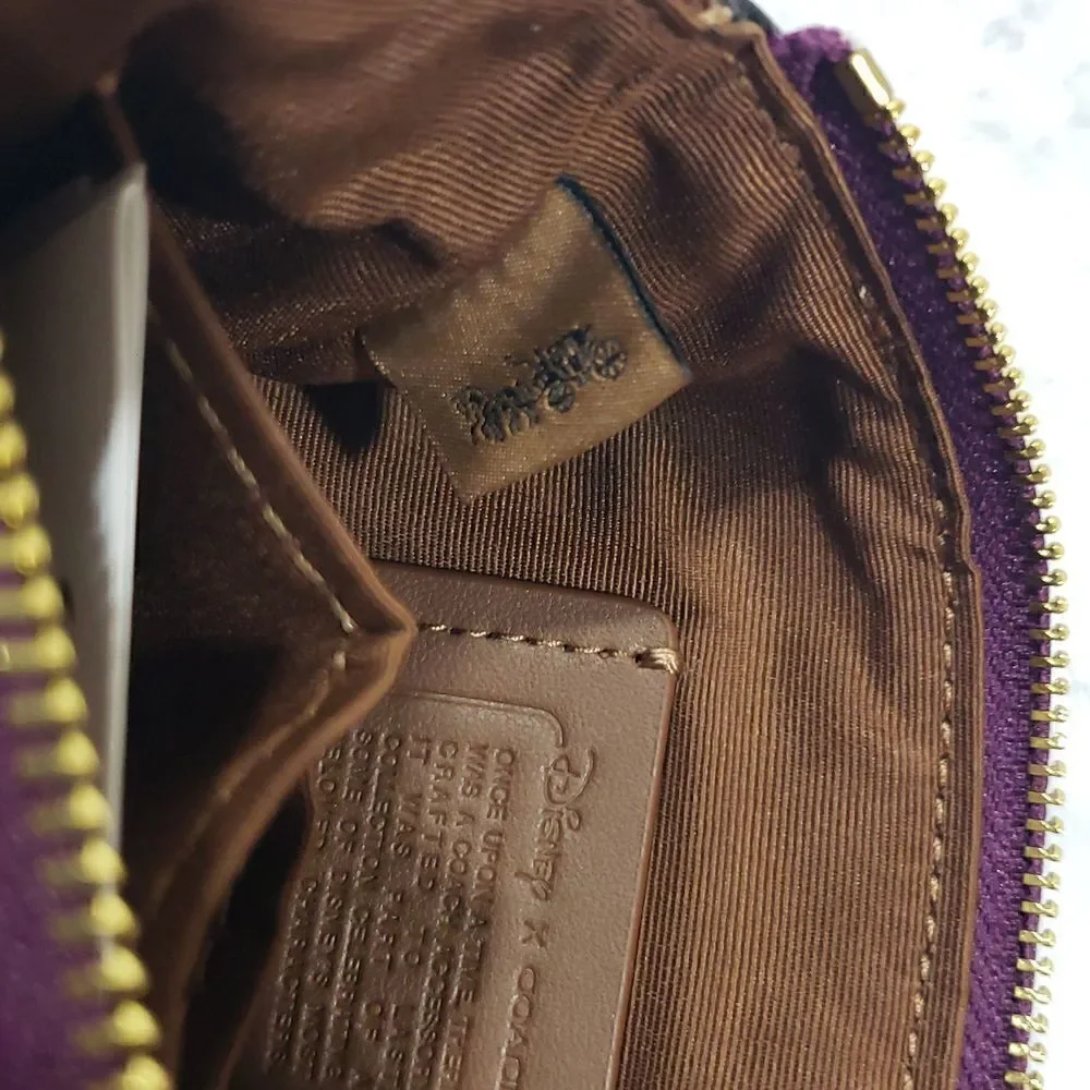 Disney X Coach Corner Zip Wristlet In Signature Canvas With Patches
